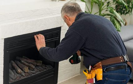 Insert set plumb beneath its mantel